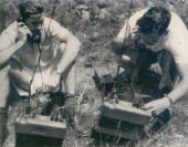 CONSTANT CHECK was maintained with the Shack-On-Wheels, which relayed broadcasts to the radio 