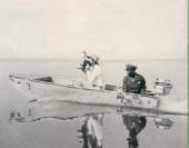  A UNIT in the little fleet of aluminum boats cuts the placid surface of Lake Victoria, one of the great inland water bodies of the world 